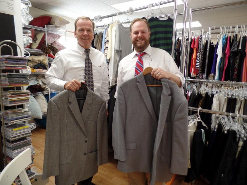 Register of Deed Bill O'Donnell with Interfaith Social Services Executive Director Rick Doane who accepted donated clothes through the Registry's Suits for Success Program to the Career Closet at Interfaith Social Services