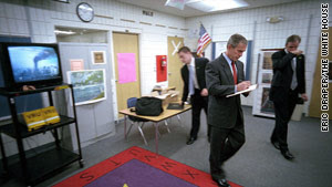 President Bush reacts to live video of the burning World Trade Center at a classroom at Emma Booker Elementary School in Sarasota.