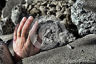 Dead Man Hand in Rubble after Earthquake Disaster
