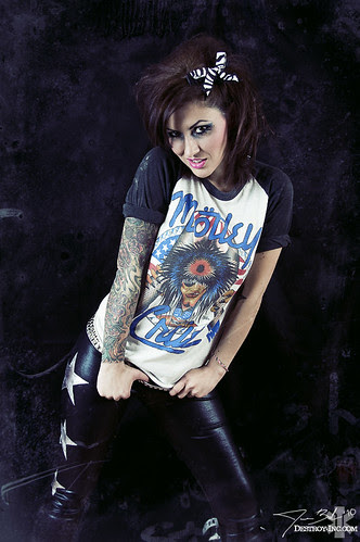 Actress is sexy woman with tattoo at arm 