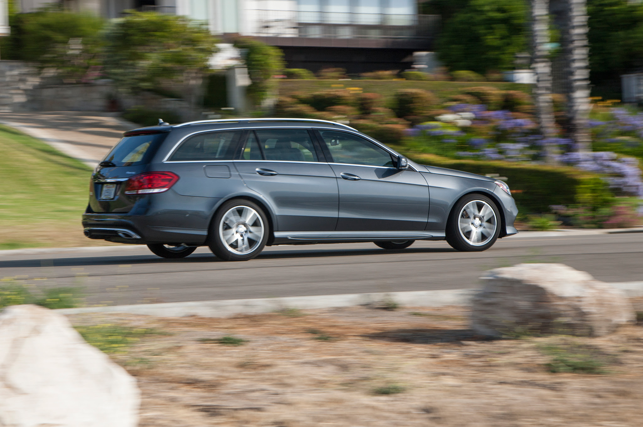 2014-Mercedes-Benz-E350-4Matic-Wagon-rear-three-quarters-in-motion-02