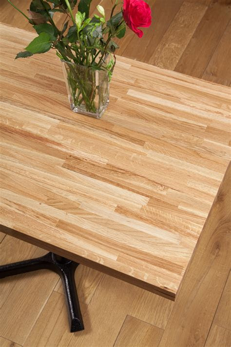 The table top with a light pickled finish over white oak veneer pairs with . Restaurant table tops, Replacement wood tabletops for cafe