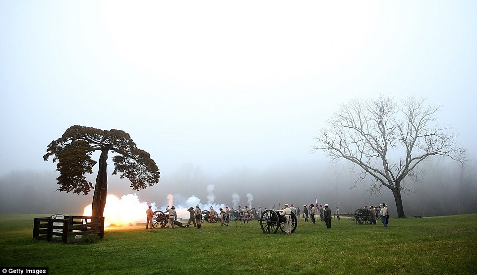 American Civil War re-enactors portraying Confederate artillery fire several of their cannons during the re-enactment