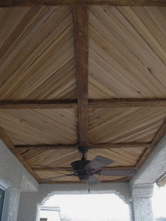 Covered Patio with Faux Wood Beam and Plank Ceiling 