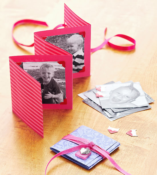 Red photo booklet made of folded card stock