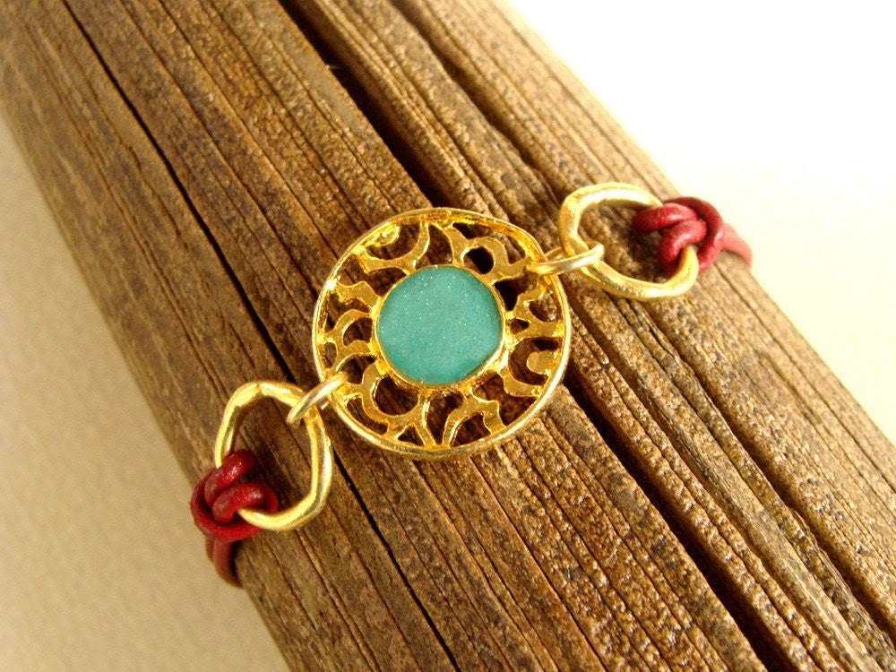 Gold & turquoise bracelet with red leather