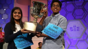 Vanya Shivashankar, left, of Olathe, Kansas, and Gokul Venkatachalam of St. Louis hold up the trophy after being declared co-winners of the 2015 Scripps National Spelling Bee. Vanya correctly spelled the word &quot;scherenschnitte&quot; and Gokul correctly spelled the word &quot;nunatak.&quot;