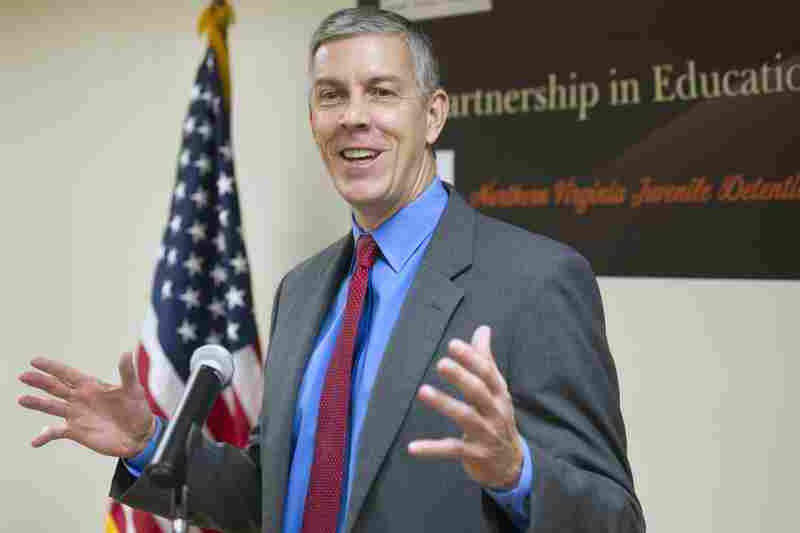 Education Secretary Arne Duncan speaks with reporters after he and Attorney General Eric Holder toured the Northern Virginia Juvenile Detention Center in Alexandria, Va., Monday, Dec. 8, 2014.