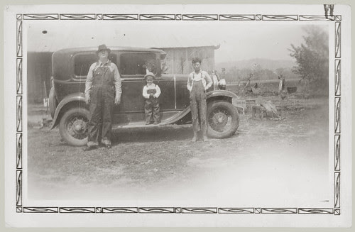 Three and a car and chickens