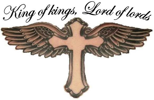cross tattoos with wings on arm. shark arm tattoo full back