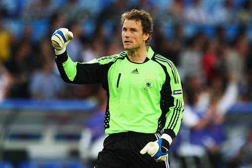 Jens Lehmann celebrates the opening goal scored by Bastian Schweinsteiger