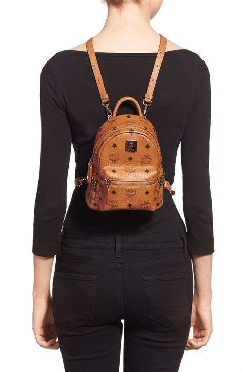 mcm mini stark studded convertible backpack
