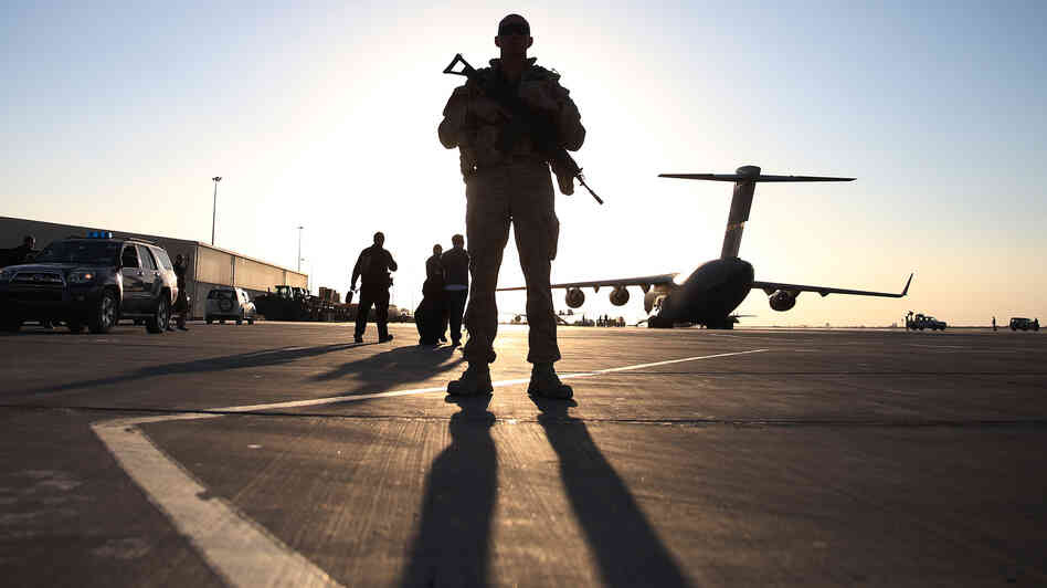 A U.S. soldier stands guard at the airfield in Kandahar, Afghanistan.