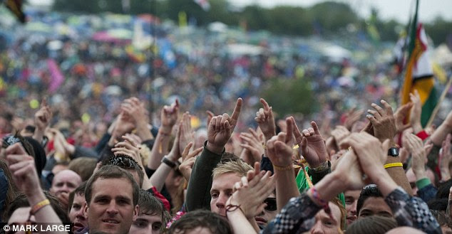 Braving all weather: The crowd didn't seem to mind about the relentless rain as they watched Biffy Clyro