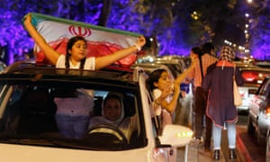 Iranians take to the streets to celebrate the nuclear deal.