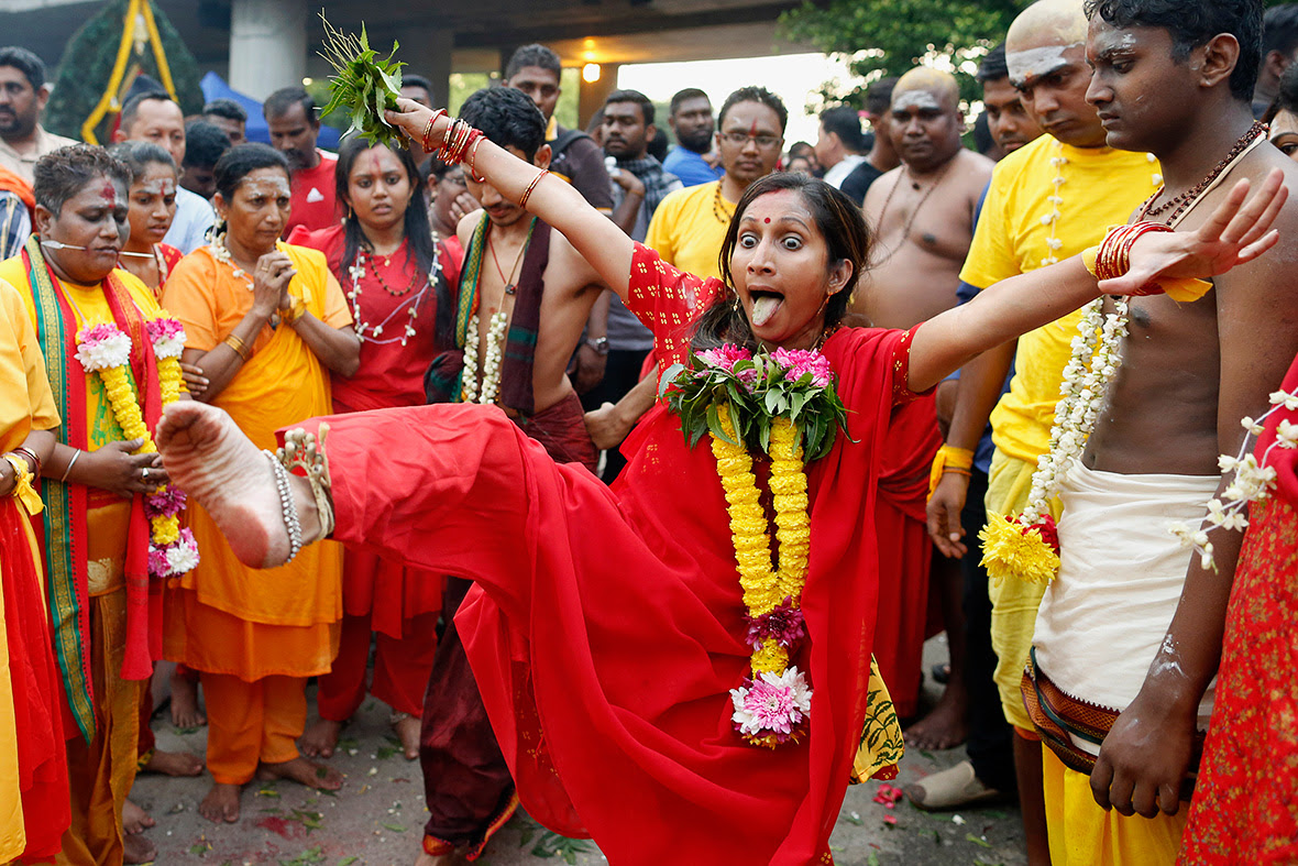 Thaipusam Festival: Hindus with facial and body piercings ...