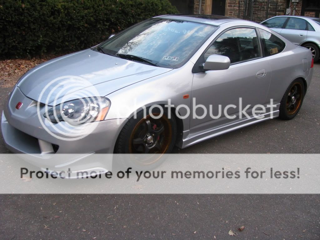 black car orange rims