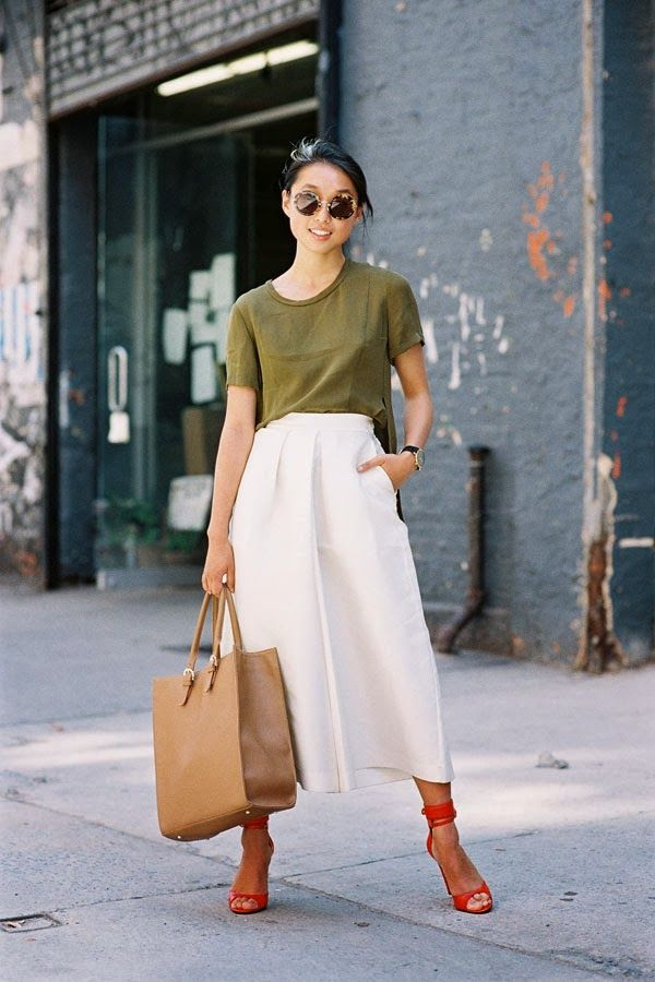 Le Fashion Blog New York Fashion Week Street Style Margaret Zhang Shine By Three Complementary Colors And Cutlottes Via Vanessa Jackman Front View Round Tort Sunglasses Low Bun Chignon Hair Olive Green Side Split Shirt Tan Tote Bag High Waisted Off White Culottes Cropped Wide Leg Pants Trousers Bright Red Ankle Wrap Heeled Sandals Heels 2 photo Le-Fashion-Blog-New-York-Fashion-Street-Style-Margaret-Zhang-Shine-By-Three-Complementary-Colors-And-Cutlottes-Via-Vanessa-Jackman-2.jpg