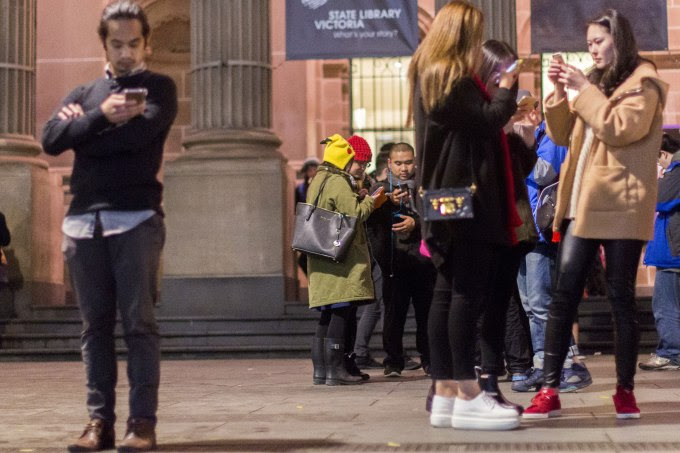 MELBOURNE, AUSTRALIA - JULY 13 : A group of Pokemon Go users playing Pokemon gathered outside the State Library of Victoria Melbourne, Australia 13 July 2016. Australia is one of only three countries where the game is currently available. (Photo by Asanka Brendon Ratnayake/Anadolu Agency/Getty Images)