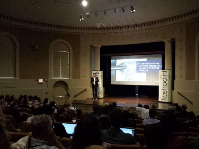 Florence Healthcare CEO Ryan Jones presents his company's eBinder Suite at a conference for medical researchers.