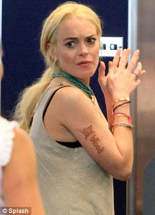 lindsay lohan miami surf. Lindsay Lohan today began