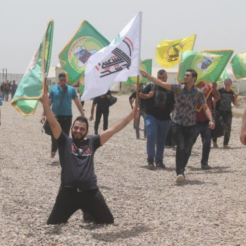 Image: New volunteers join the Babylonian Brigades' military training camp near Baghdad.