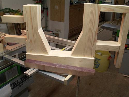  made a holder out of wood for cutting the other side on the table saw