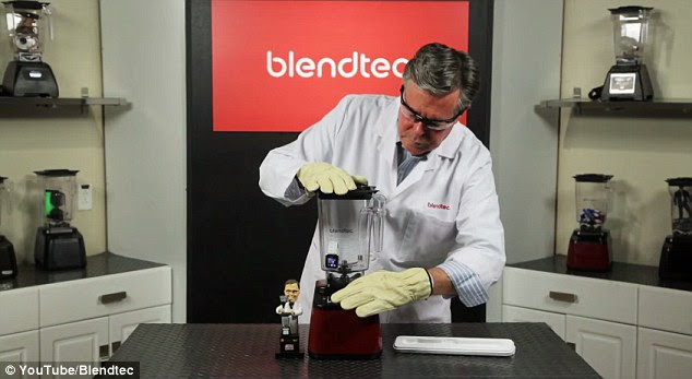 After a light-hearted exchanged with 'Siri', Mr Dickson places the watch in the blender (pictured) and presses the start button while holding the lid. He also advises viewers not to try this at home