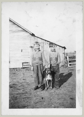 Two boys and a dog