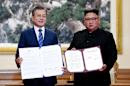 The Latest: Moon, Kim to visit volcano considered sacred