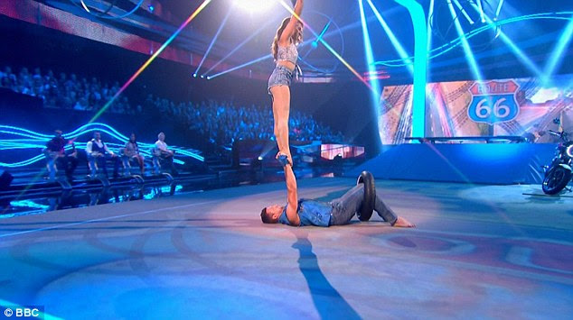 Extreme strength: Professional boxer Carl Froch had no problem lifting up his partner 