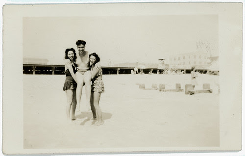 Two girls, one guy, the beach