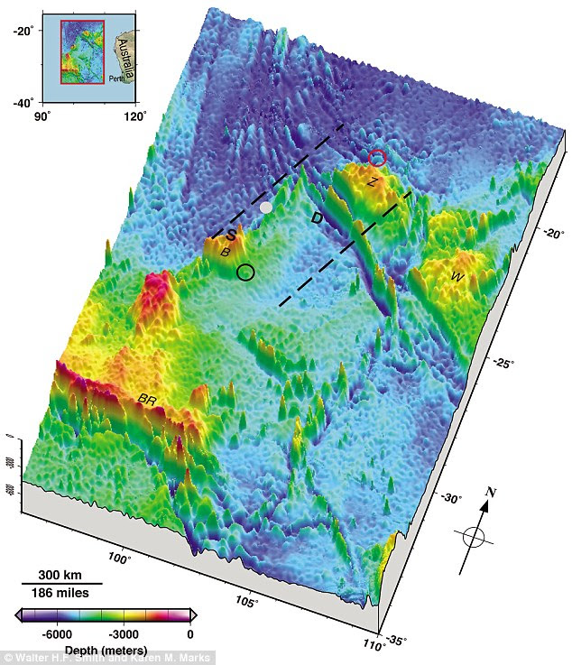 A new seafloor topography of the Malaysia Airlines flight MH370 search area has been released (pictured). Dashed lines approximate the search zone for sonar pings emitted by the flight data recorder and cockpit voice recorder popularly called black boxes. The first sonar contact (black circle) was made by a Chinese vessel