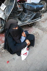 Please Dont Ask If She is a Shia or a Sunni.. She is certainly not a Wahabbi they dont beg on the Streets ..Luckily they were born Rich by firoze shakir photographerno1