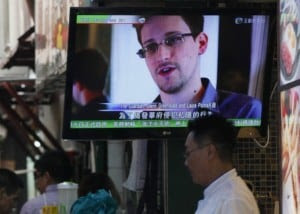 Edward Snowden on a TV screen in Hong Kong (Kin Cheung/AP)