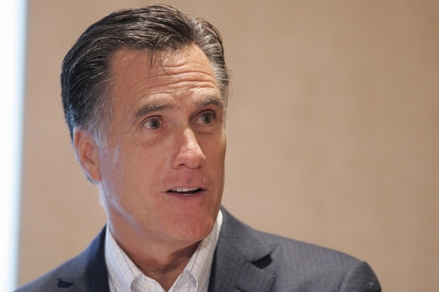 Former Massachusetts Governor Mitt Romney delivers an address on health care reform in Ann Arbor, Michigan.