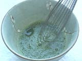 Powdered Matcha Green tea is traditionally whisked into hot water with a chashaku or bamboo spoon