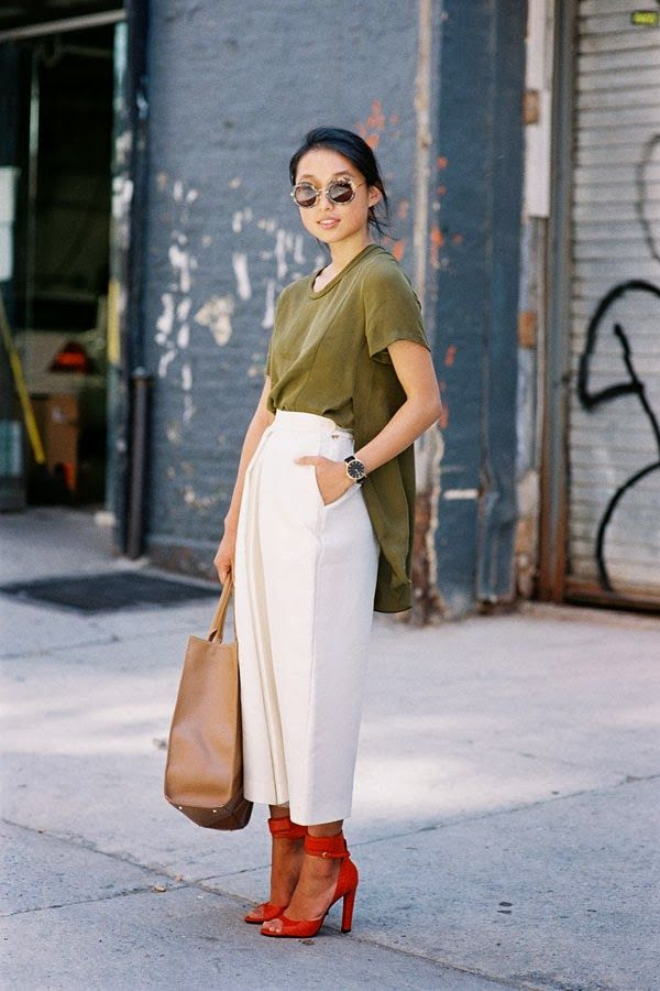 Le Fashion Blog New York Fashion Week Street Style Margaret Zhang Shine By Three Complementary Colors And Cutlottes Via Vanessa Jackman Side Shot Round Tort Sunglasses Low Bun Chignon Hair Olive Green Side Split Shirt Tan Leather Tote Bag High Waisted Off White Culottes Cropped Wide Leg Pants Trousers Bright Red Ankle Wrap Heeled Sandals Heels 1 photo Le-Fashion-Blog-New-York-Fashion-Street-Style-Margaret-Zhang-Shine-By-Three-Complementary-Colors-And-Cutlottes-Via-Vanessa-Jackman-1.jpg