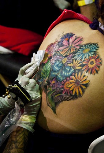 Making Tattoos upper back girl  