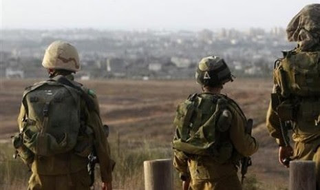 Israeli soldiers patrol near the border with the Gaza Strip. (file photo) 