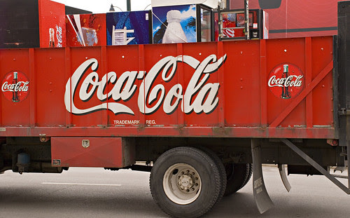newsweek logo. Coca-Cola and its logo are
