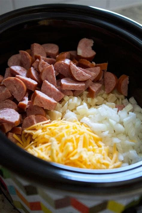 The mouthwatering dish is easy to prepare and features some of our favorite comfort foods: Crockpot Hashbrown Casserole with Smoked Sausage | Lauren's Latest