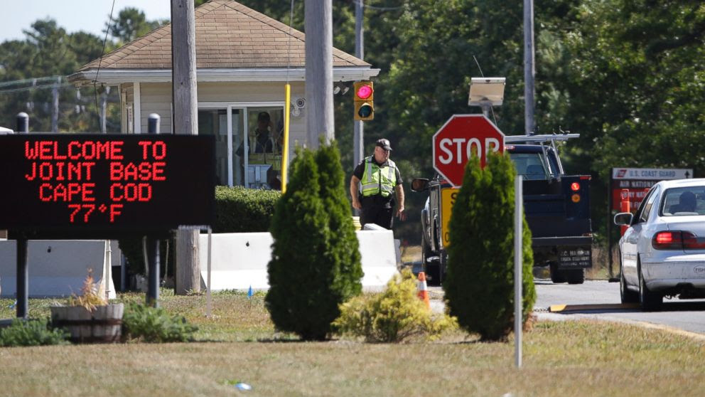 PHOTO: Vehicles are stopped by security personal as they enter a gate on Sept. 22, 2014, to Camp Edwards, Mass., on Cape Cod. 