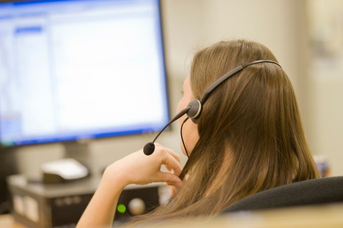 Woman in call center on phone