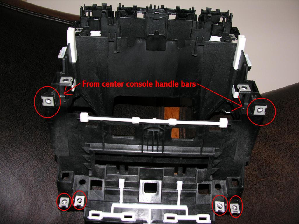 9) Remove the single-DIN cage