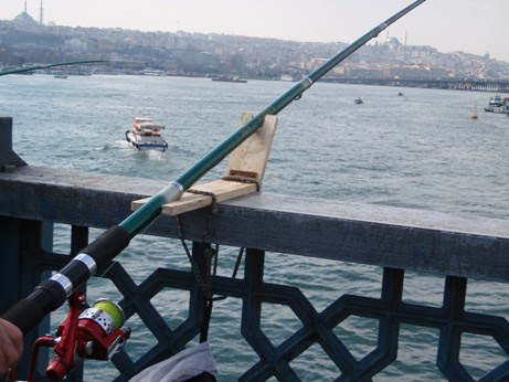 fishing rod cartoon. cartoon fishing rod.