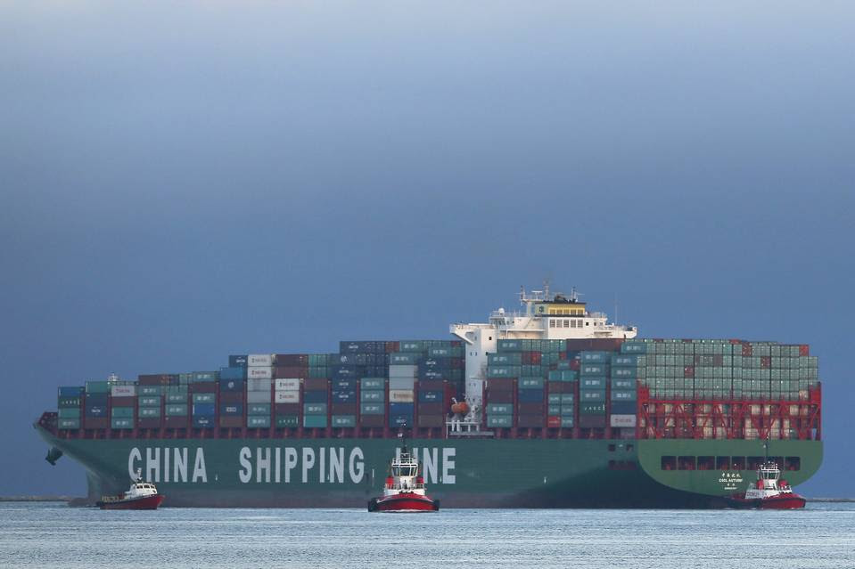 A China Shipping Container Lines Co. ship is seen near the Port of Los Angeles. The Chinese slowdown is beginning to take a toll on U.S. companies. 