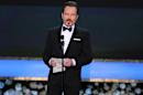 FILE - In this Jan. 25, 2015 file photo, Bryan Cranston presents the award for outstanding female actor in a comedy series on stage at the 21st annual Screen Actors Guild Awards at the Shrine Auditorium in Los Angeles. The upcoming Broadway musical "Finding Neverland" has found a new producer - Cranston. Lead producer Harvey Weinstein said Friday, Feb. 27, 2015, that the Tony Award-winning “Breaking Bad” star had signed up after being enchanted by an early workshop. (Photo by Vince Bucci/Invision/AP, File)