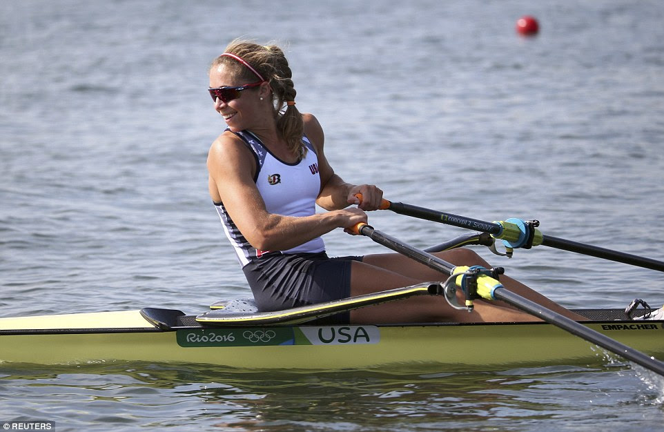 Genevra Stone of the United States of America reacts she races in the women's single sculls event at Lagoa Stadium, Rio