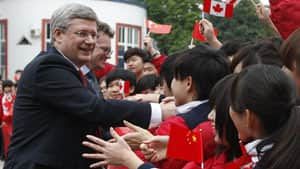 Prime Minister Stephen Harper, shown on a visit to China earlier this year, has yet to secure a free-trade agreement in the Asia Pacific region. 